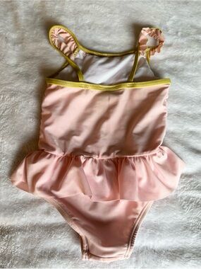 Revolution Pink One-Piece Swimsuit with Yellow Trim and Ruffle